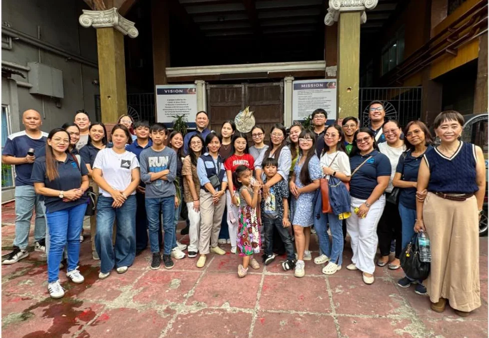 The choir gathered outside San Felipe Neri Parish after Sunday Mass